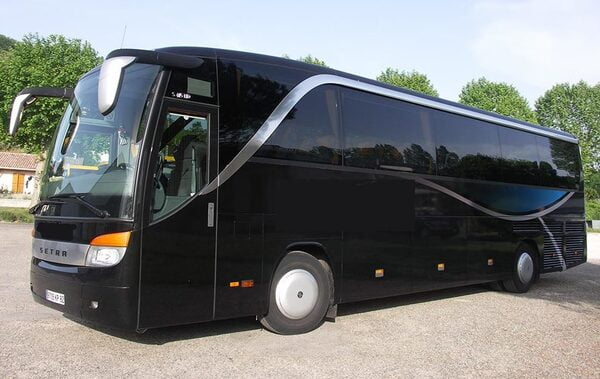 Sleek 44-seater luxury coach available for hire in Marseille, featuring a black exterior