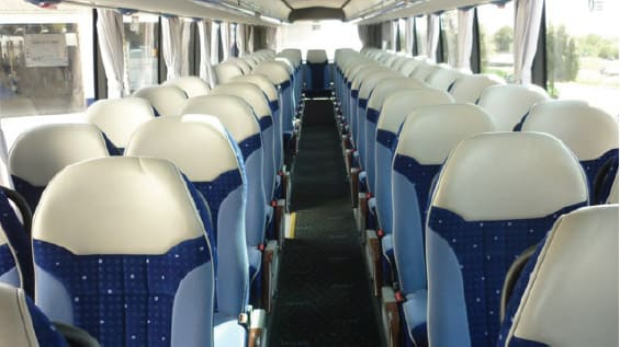 A Tourisme coach is almost as comfortable as a Grand Tourisme coach, but it has a bit less space between each row of seats