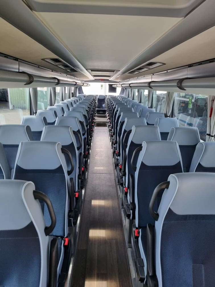 A Standard coach is less comfortable than an executive coach. Usually seats are not reclining seats and it has no toilets
